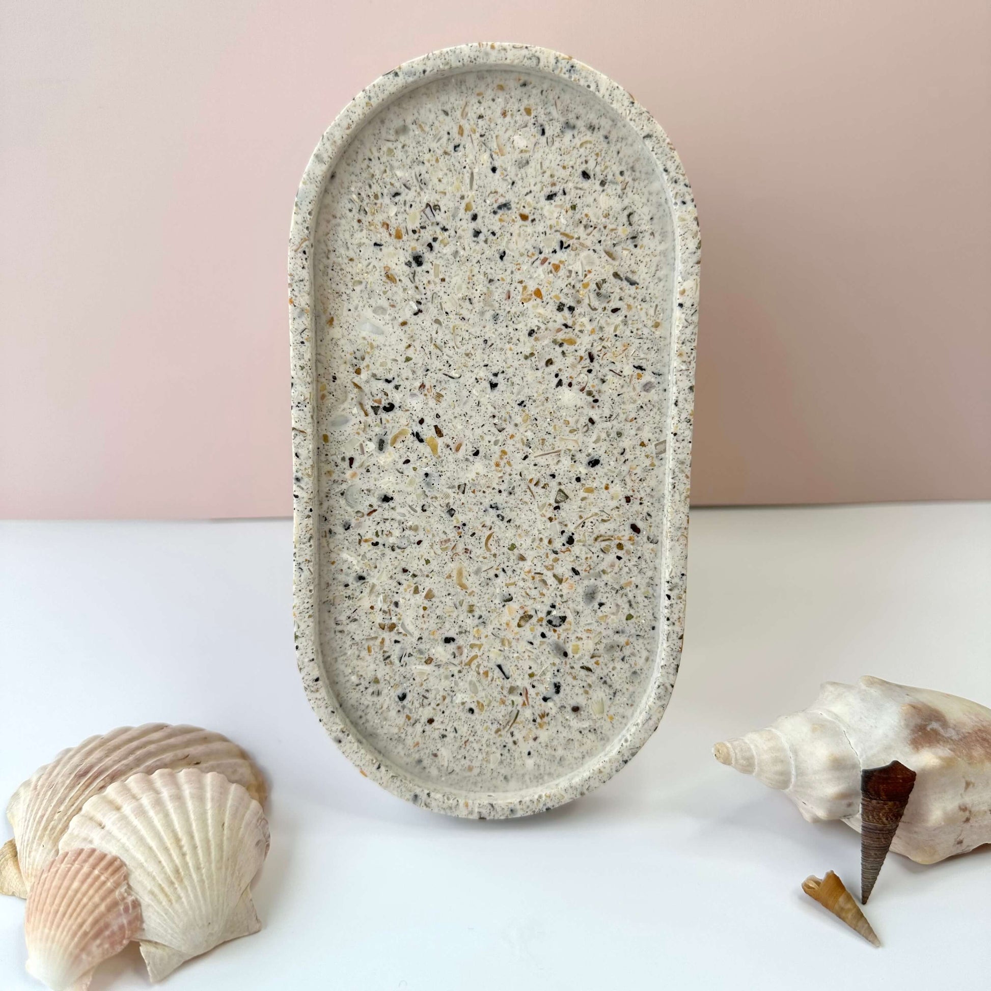 Original oval trinket tray made with sand and shells and a white base