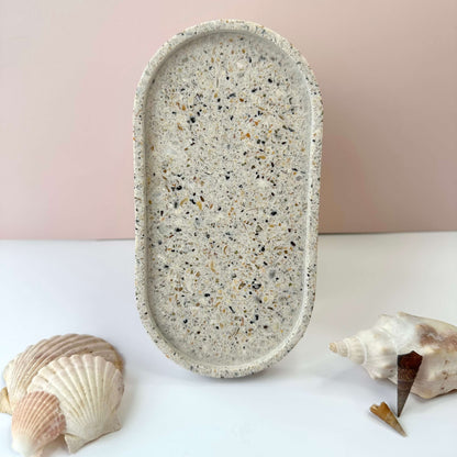 Original oval trinket tray made with sand and shells and a white base