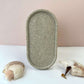 Original oval trinket tray made with sand and a white base