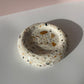 Doughnut trinket catchall made with shells and a white base